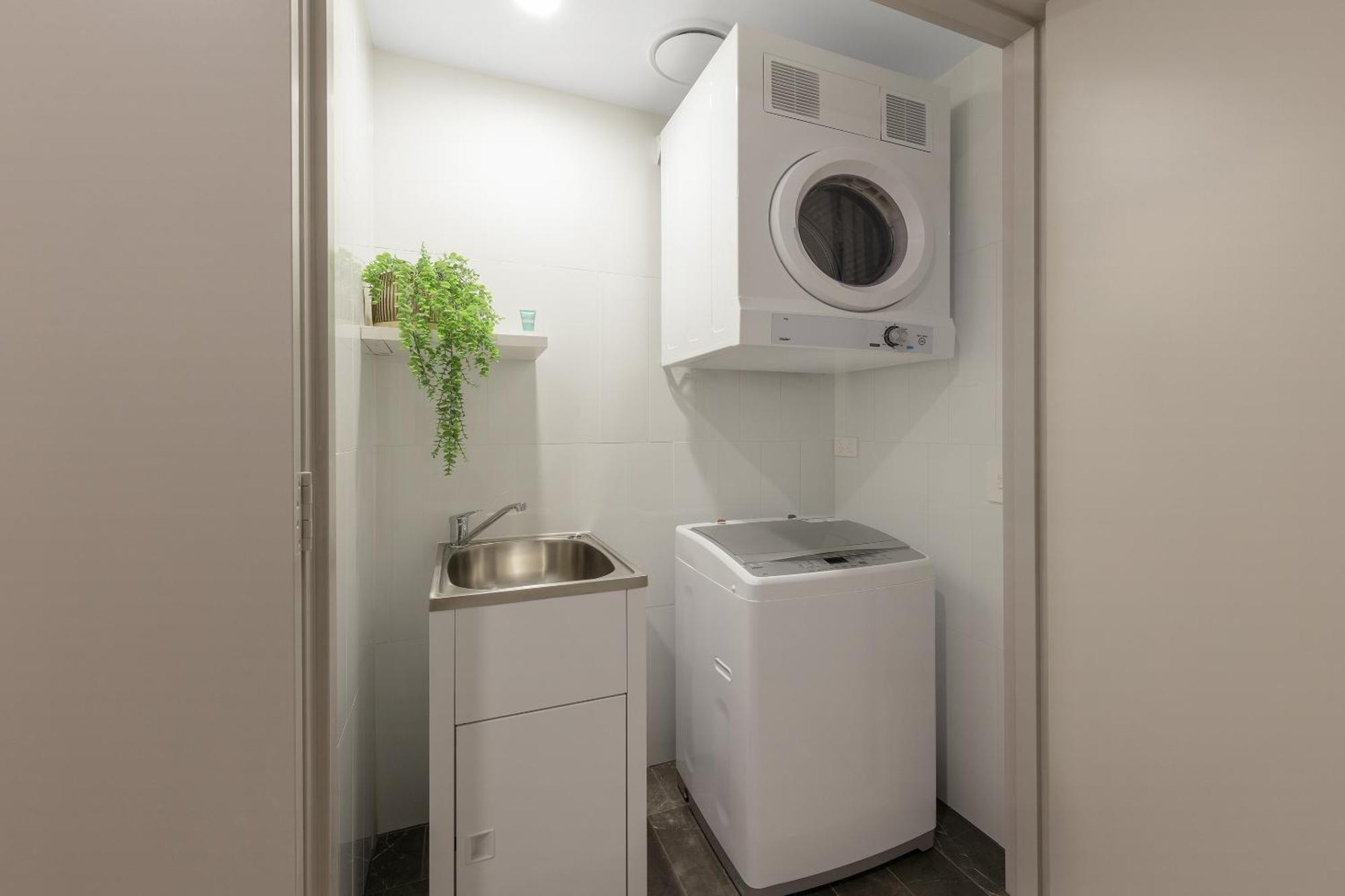 Meriton Suites North Ryde Sydney Exterior foto Laundry room